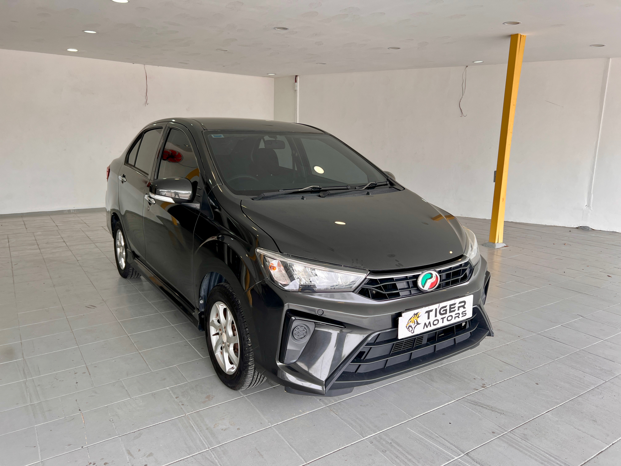 2020 Perodua Bezza 1.0 G in Black, recently sold by Tiger Motors in Kuching, Sarawak