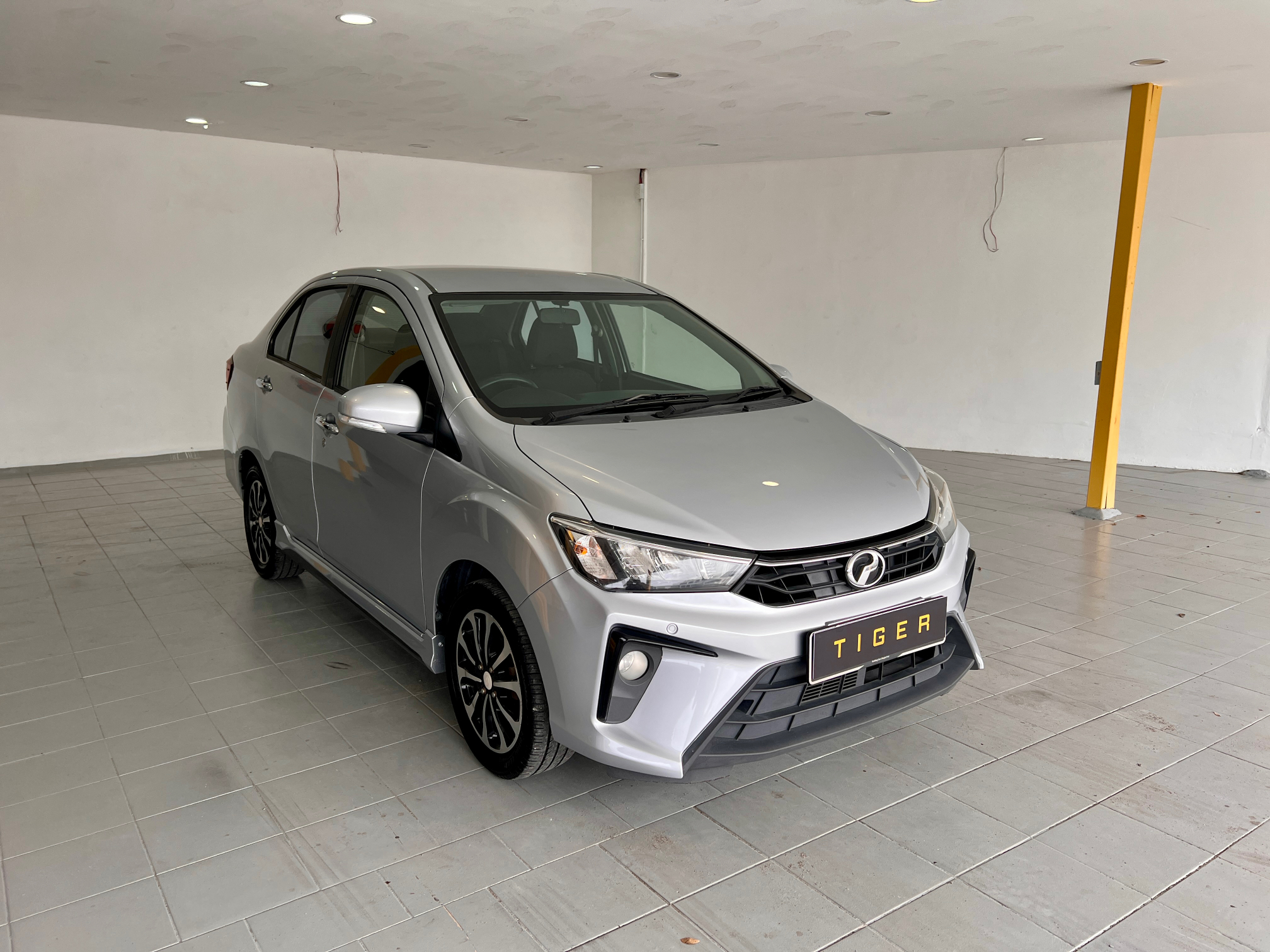 2022 Perodua Bezza 1.3 X in Silver, recently sold by Tiger Motors in Kuching, Sarawak
