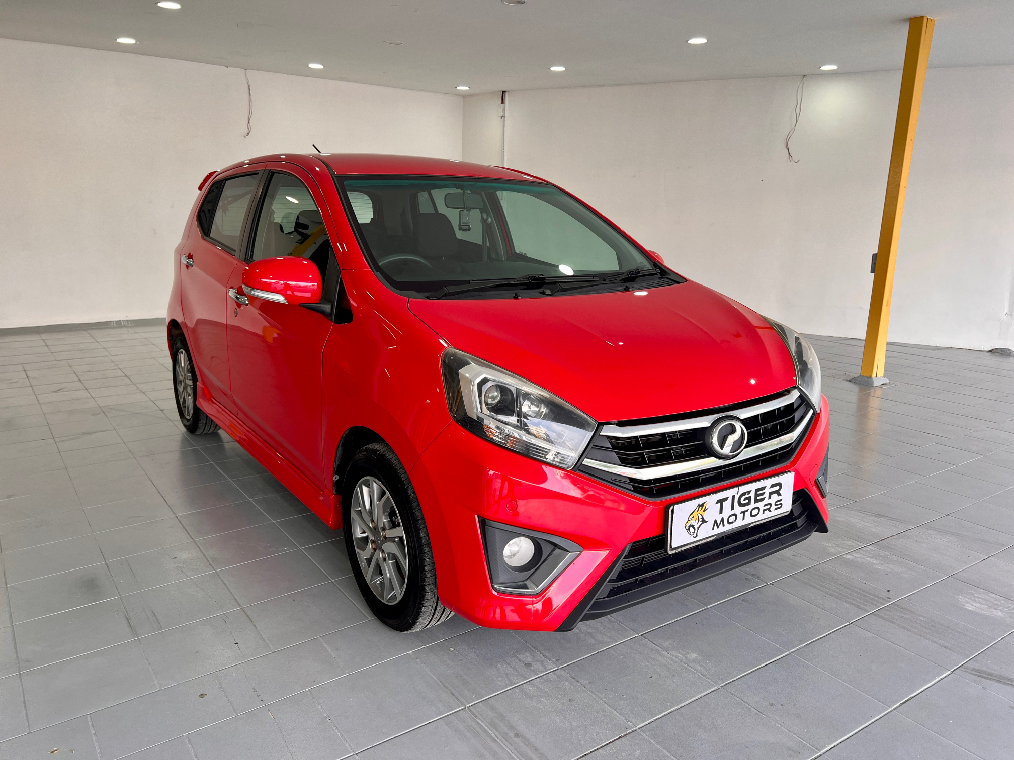 2019 Perodua Axia 1.0 SE in Red, recently sold by Tiger Motors in Kuching, Sarawak