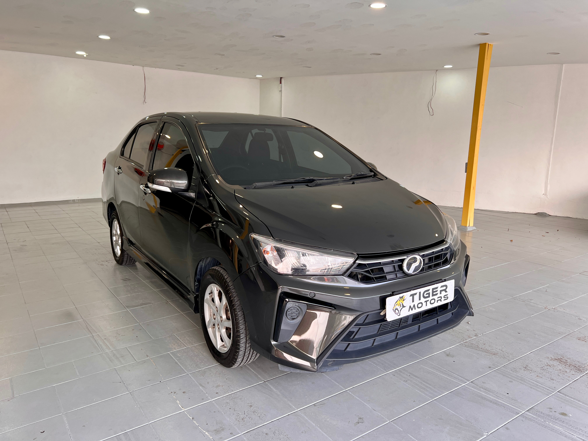 2020 Perodua Bezza 1.0 G in Black, recently sold by Tiger Motors in Kuching, Sarawak