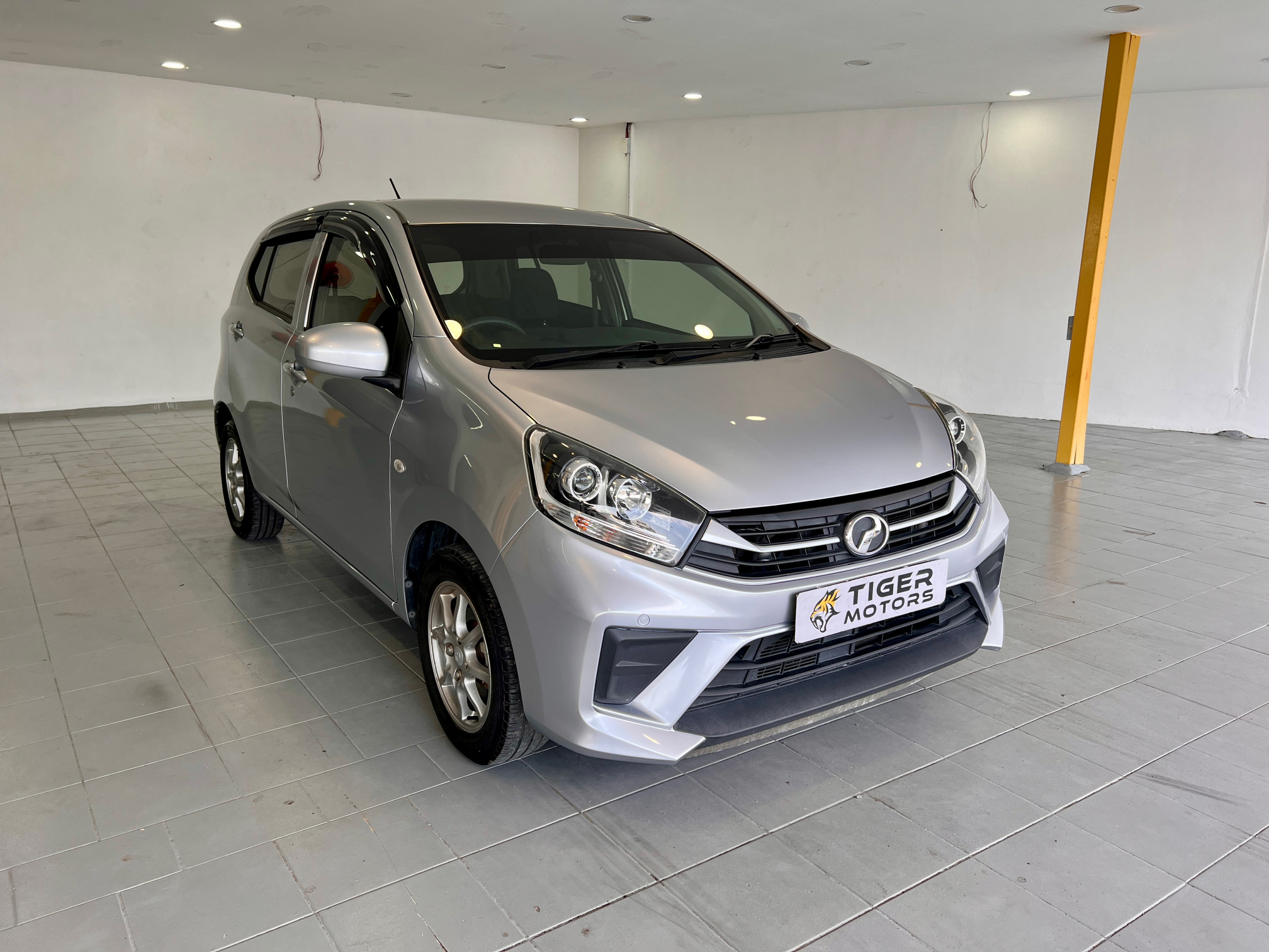 2021 Perodua Axia 1.0 G in Silver, recently sold by Tiger Motors in Kuching, Sarawak