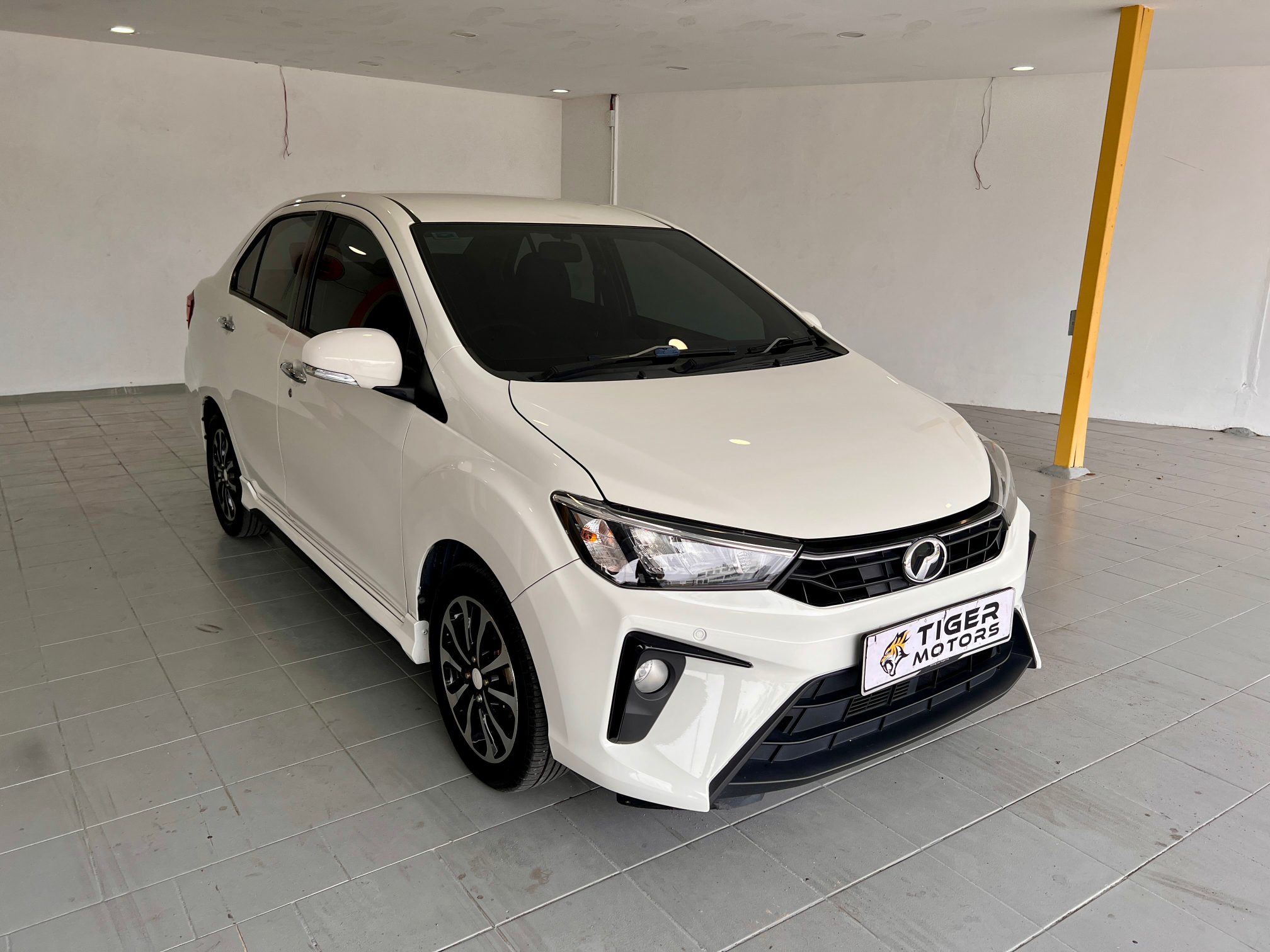 2020 Perodua Bezza 1.3 X in White, recently sold by Tiger Motors in Kuching, Sarawak