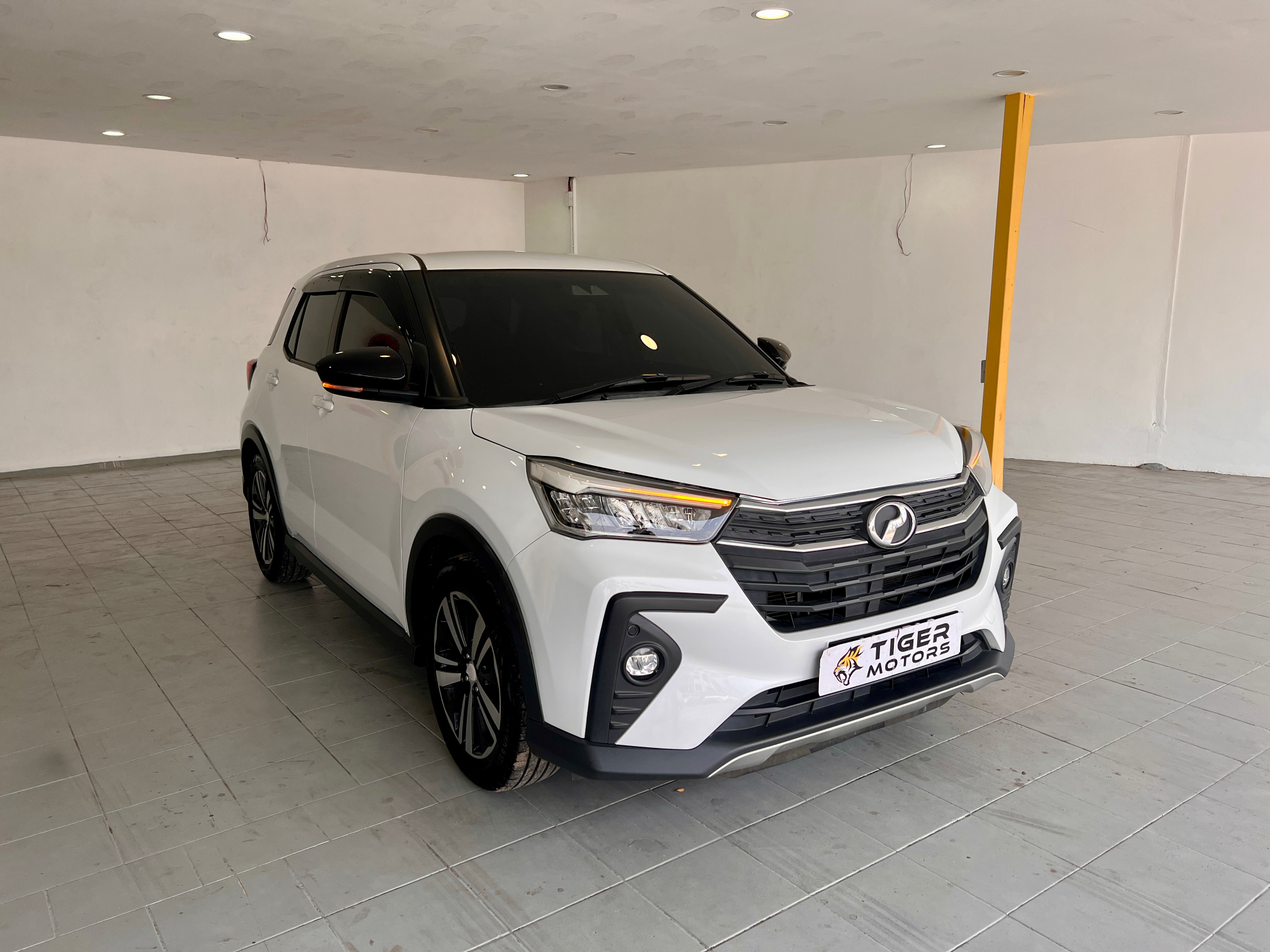2022 Perodua Ativa 1.0 H Turbo in White, recently sold by Tiger Motors in Kuching, Sarawak