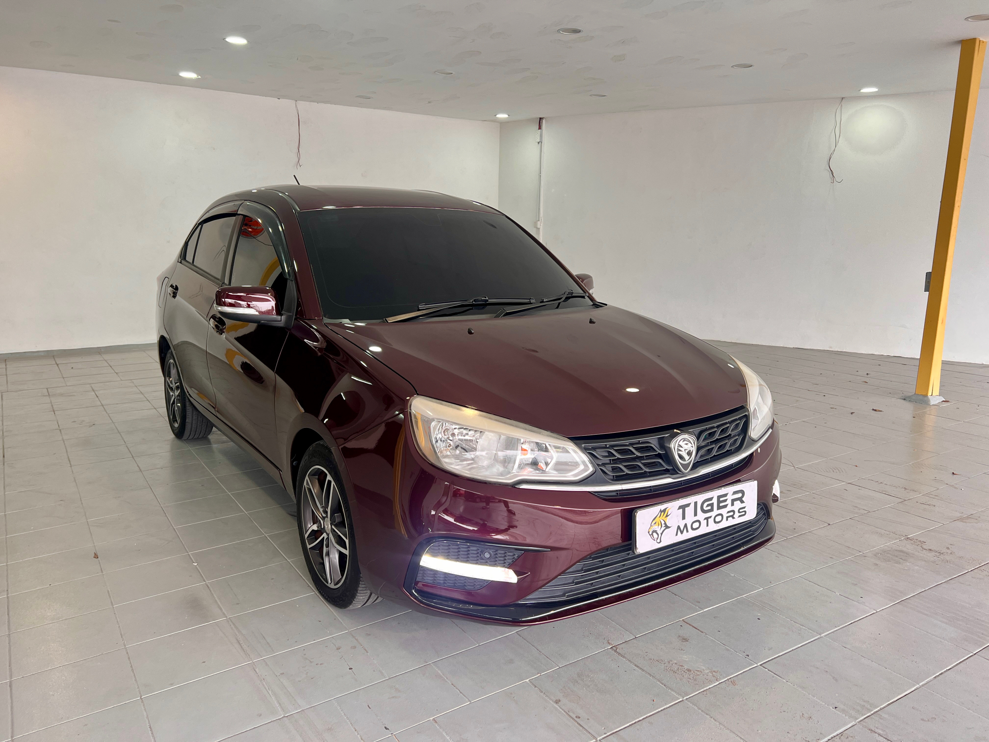 2019 Proton Saga 1.3 Premium in Maroon, recently sold by Tiger Motors in Kuching, Sarawak