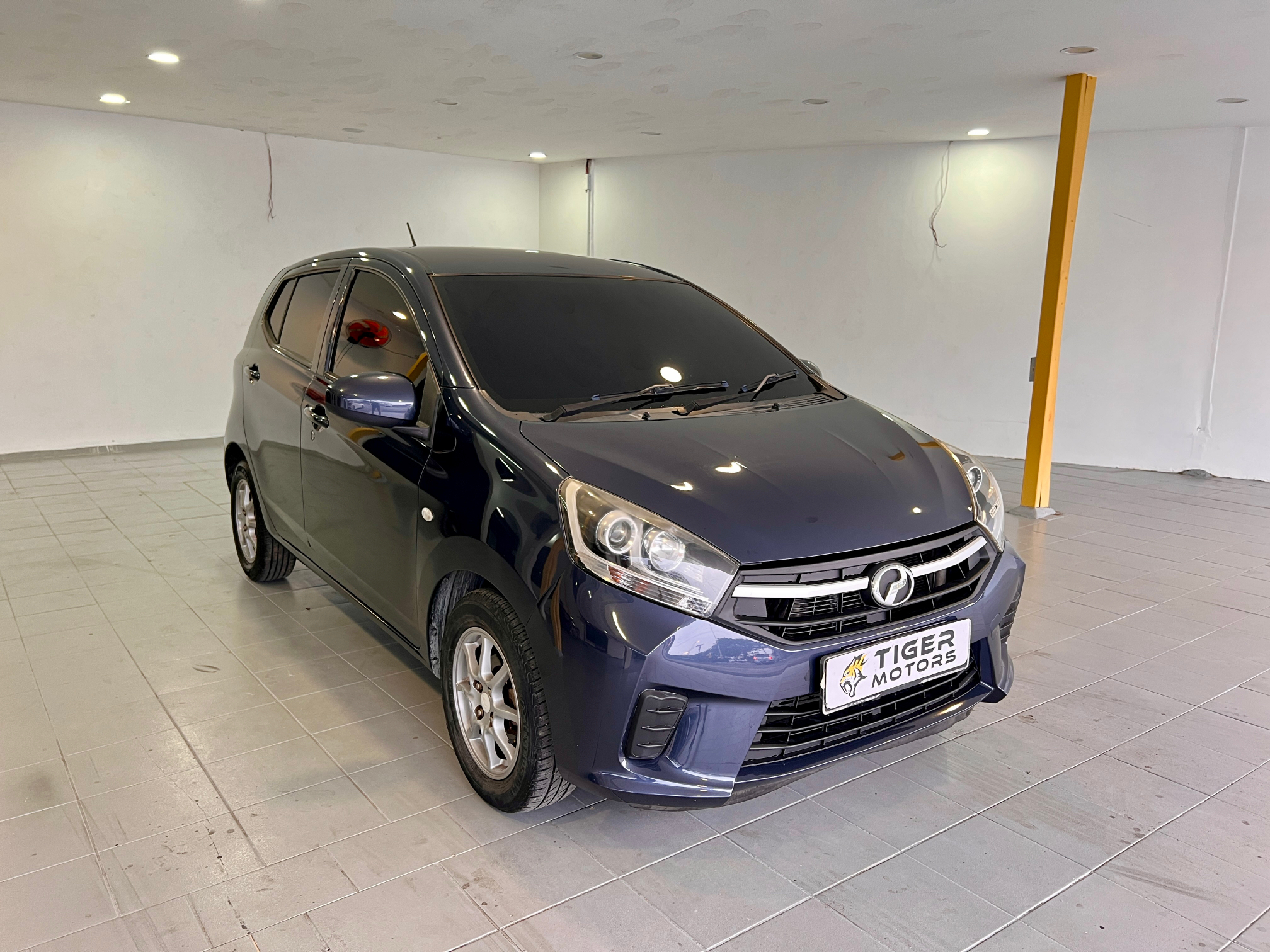2019 Perodua Axia 1.0 G in Blue, recently sold by Tiger Motors in Kuching, Sarawak