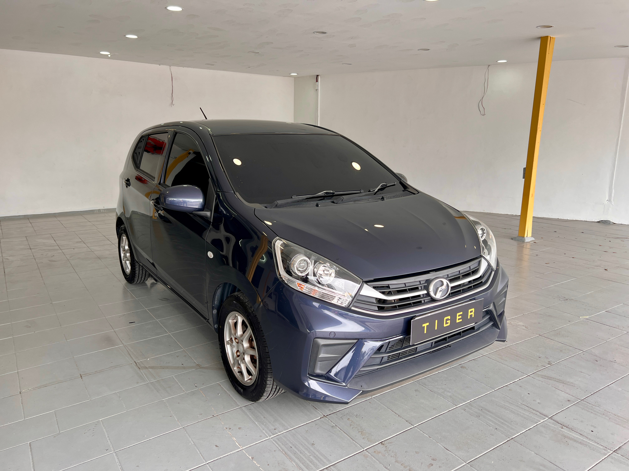 2021 Perodua Axia 1.0 G-Xtra in Blue, recently sold by Tiger Motors in Kuching, Sarawak