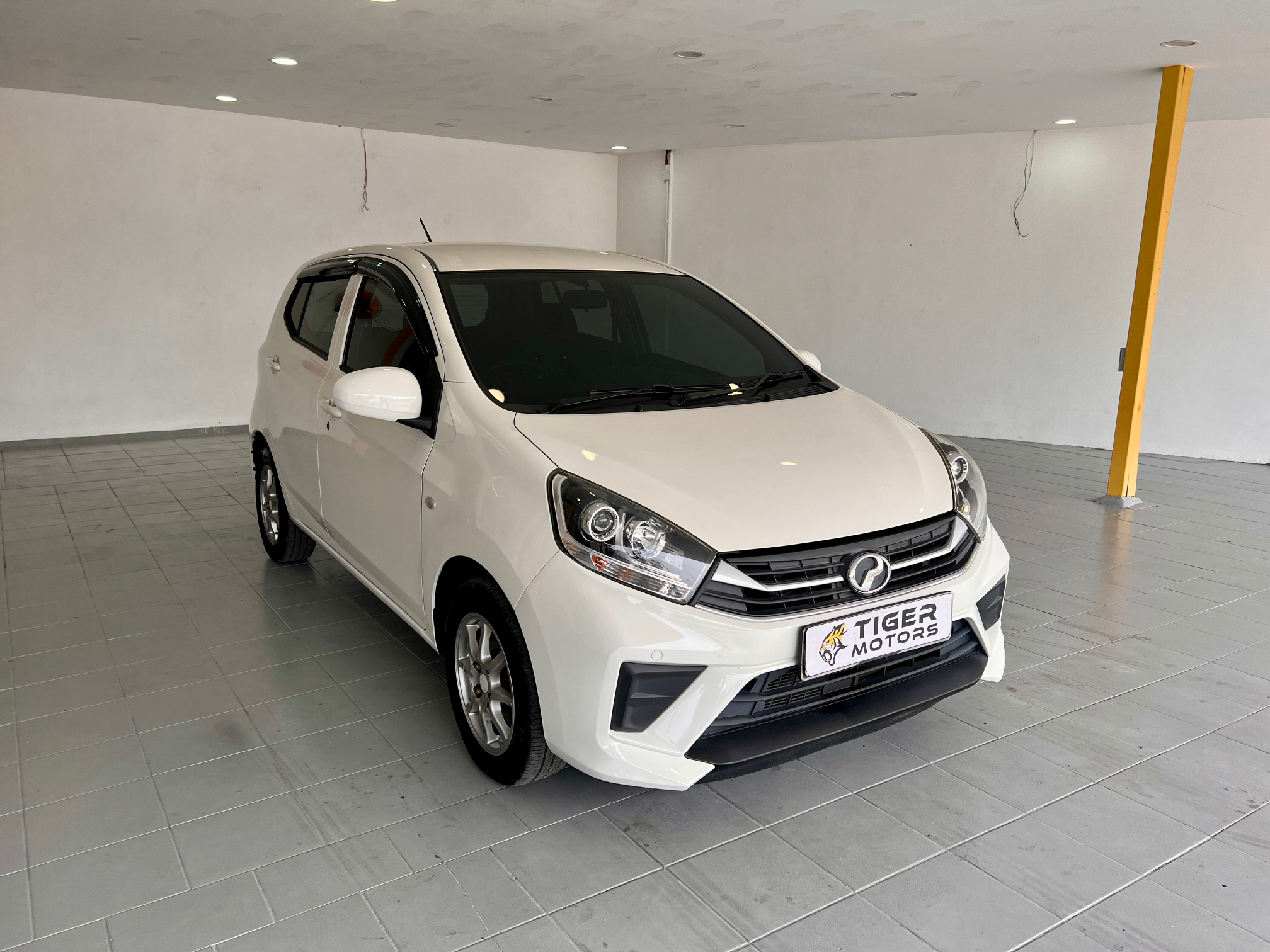2021 Perodua Axia 1.0 G-Xtra in White, recently sold by Tiger Motors in Kuching, Sarawak