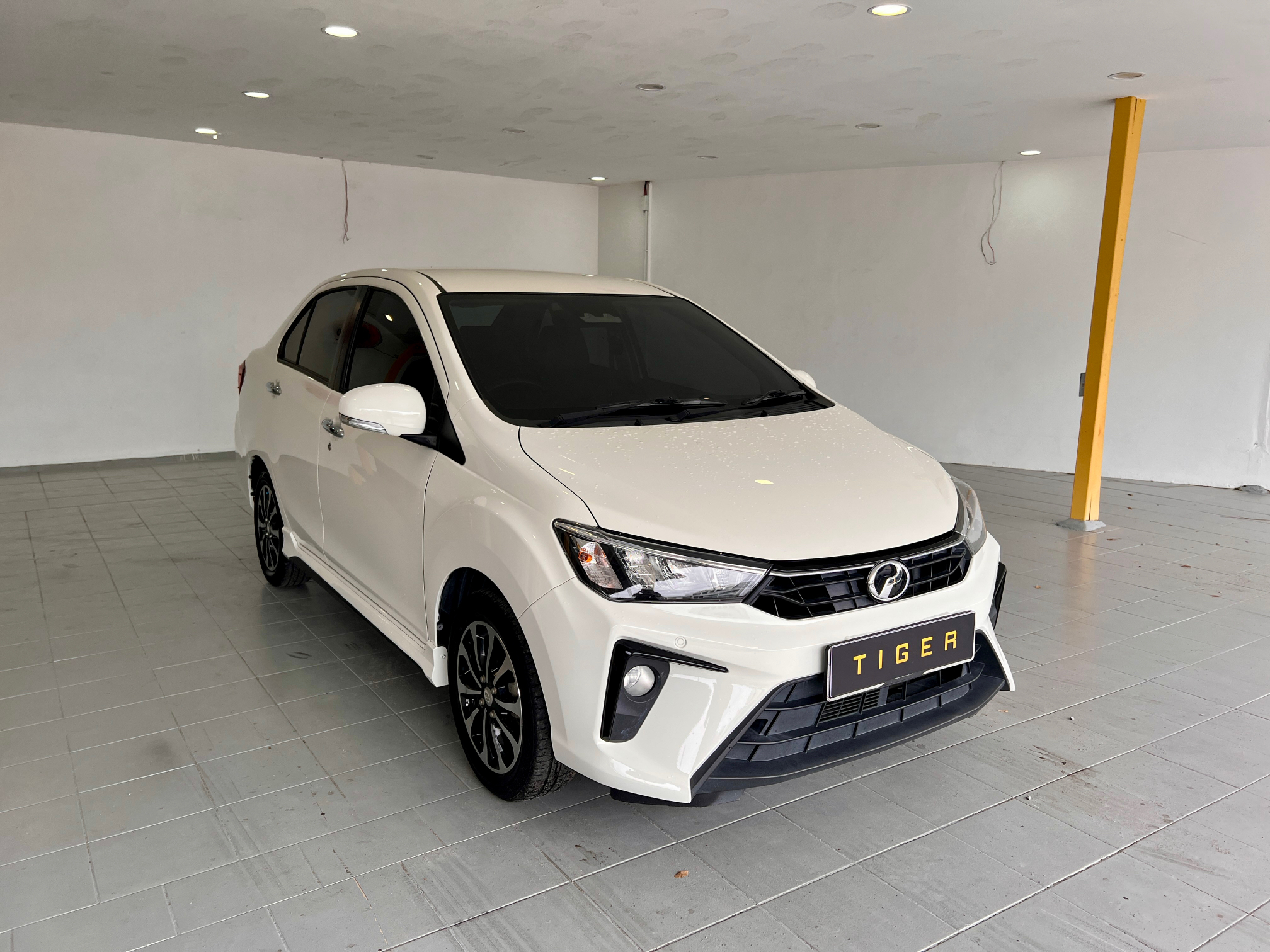 2021 Perodua Bezza 1.3 AV in White, recently sold by Tiger Motors in Kuching, Sarawak