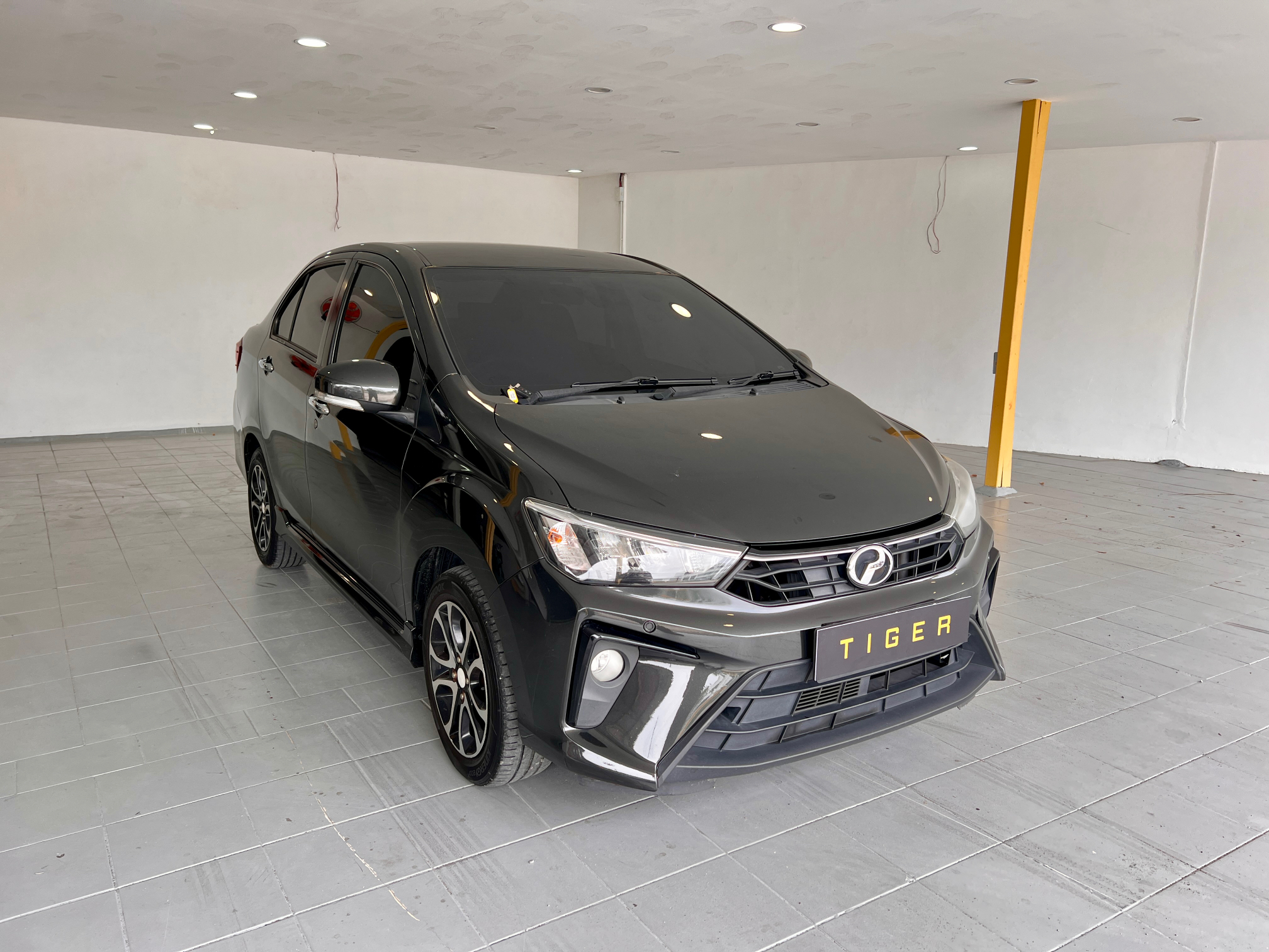 2021 Perodua Bezza 1.3 X in Black, recently sold by Tiger Motors in Kuching, Sarawak