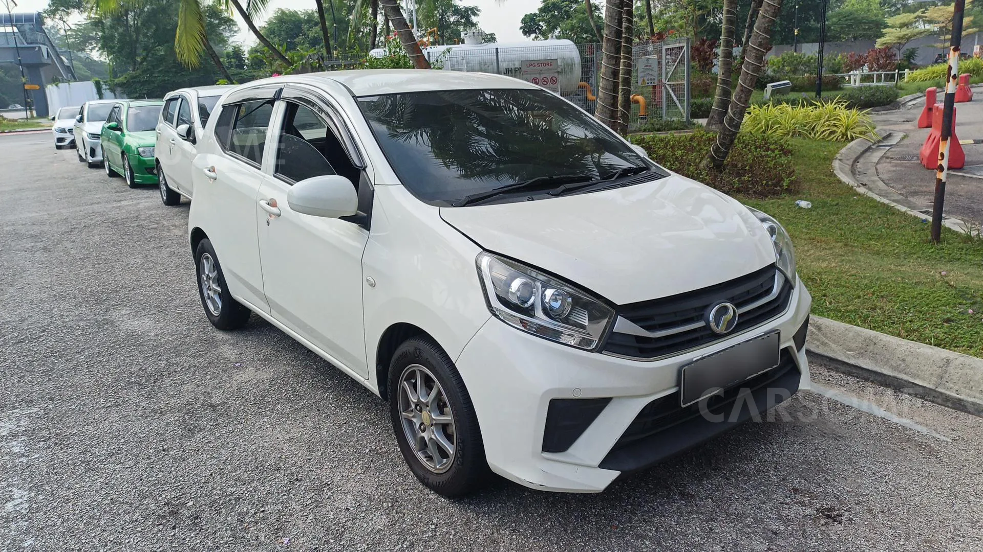 2021 Perodua Axia 1.0 G-Xtra in White, recently sold by Tiger Motors in Kuching, Sarawak